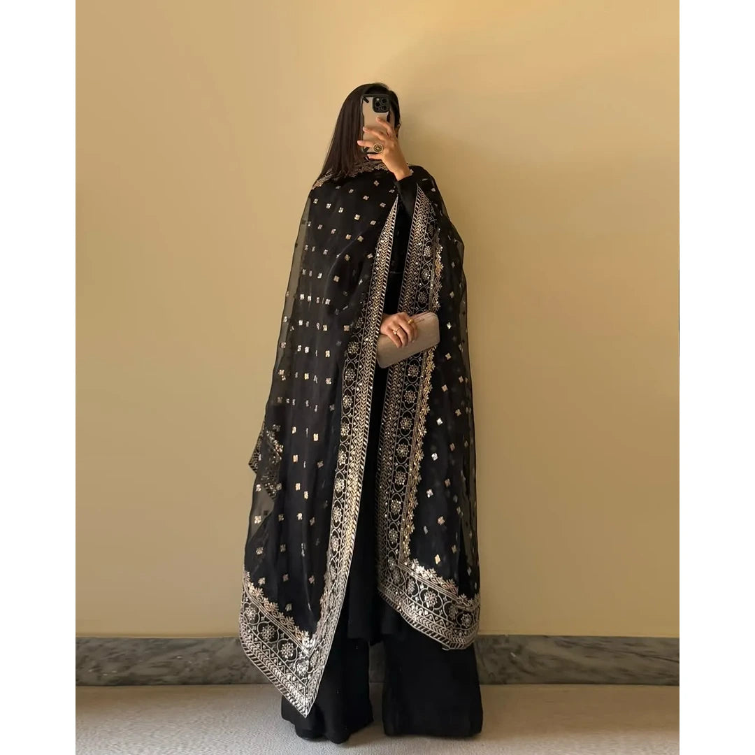 Midnight Muse.    Midnight Black Fox Georgette Flared Kurti with Handcrafted Potli Buttons & Zari Dupatta
