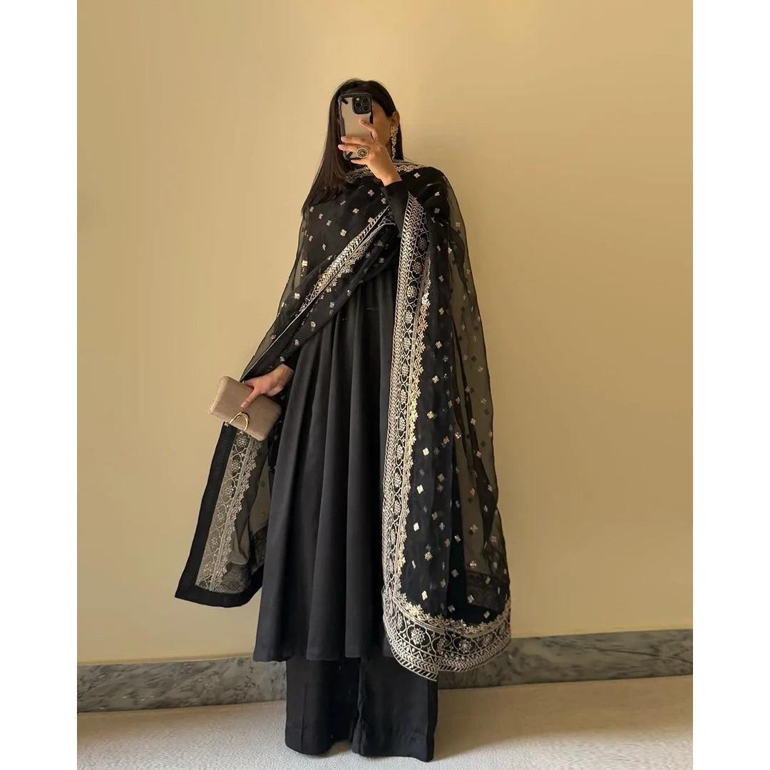 Midnight Muse.    Midnight Black Fox Georgette Flared Kurti with Handcrafted Potli Buttons & Zari Dupatta