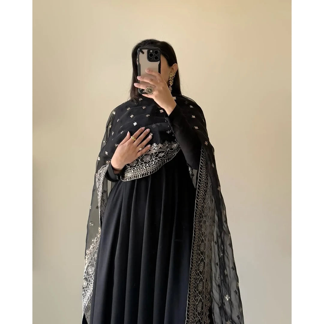 Midnight Muse.    Midnight Black Fox Georgette Flared Kurti with Handcrafted Potli Buttons & Zari Dupatta