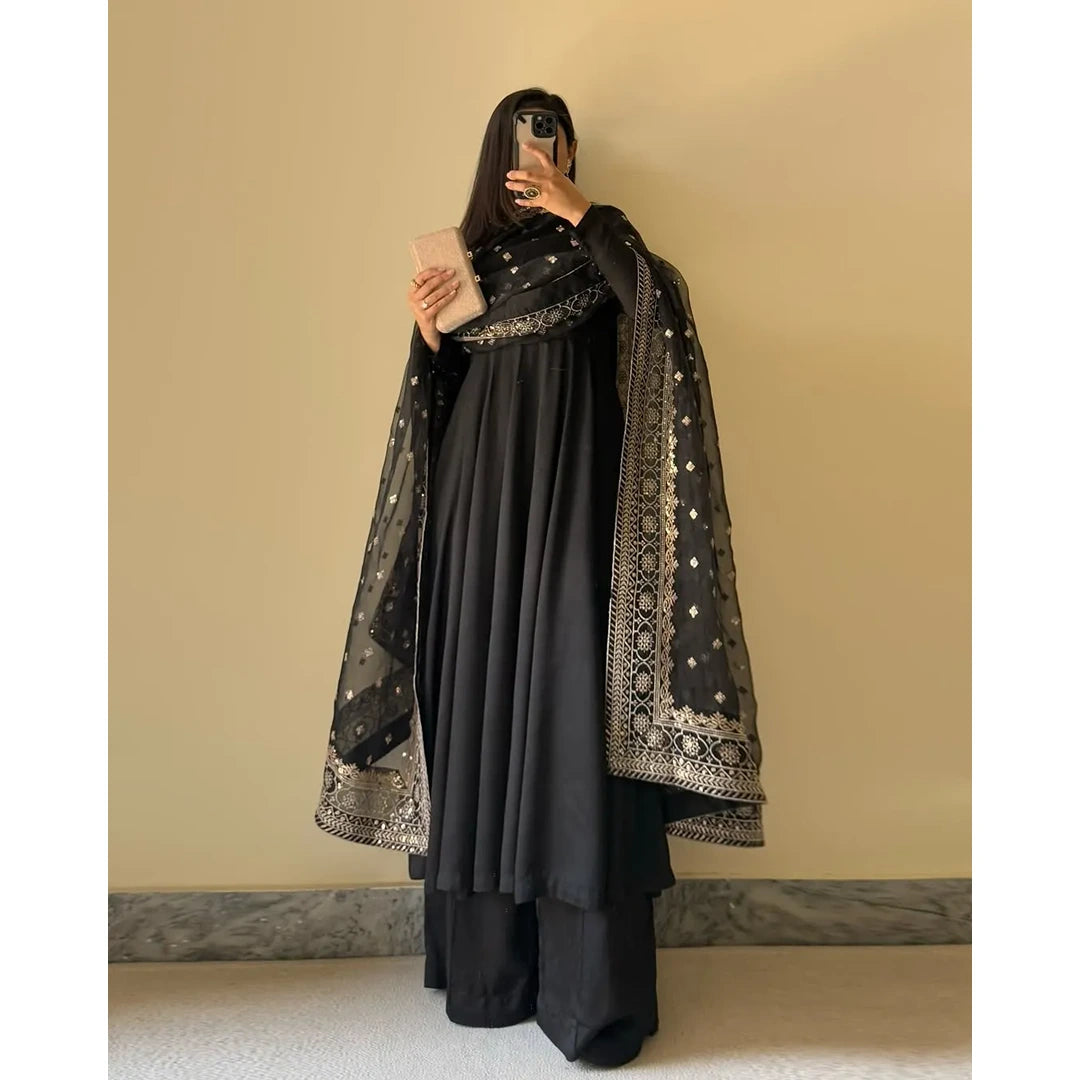 Midnight Muse.    Midnight Black Fox Georgette Flared Kurti with Handcrafted Potli Buttons & Zari Dupatta